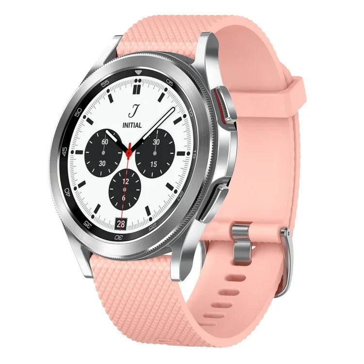 20mm silicone watch band for Samsung Galaxy Watch in pink attached to a Samsung Galaxy Watch 4 Classic.